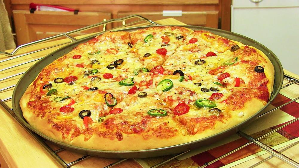 طريقة عجينة العشر دقائق للبيتزا